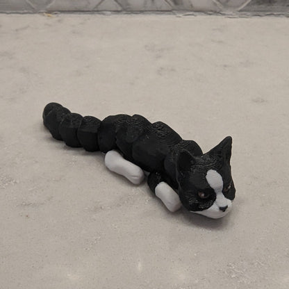 3d Printed Flexi Cats - White, Black and White, Yellow, Black, Siamese, Gray, Black with Purple Hat