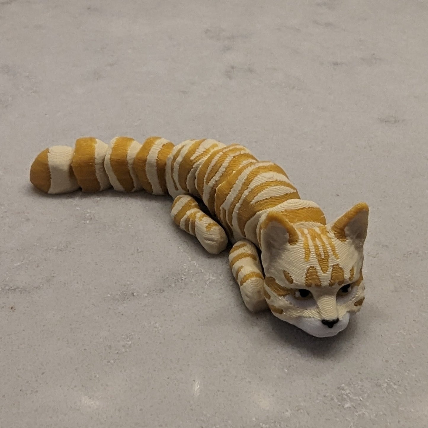 3d Printed Flexi Cats - White, Black and White, Yellow, Black, Siamese, Gray, Black with Purple Hat