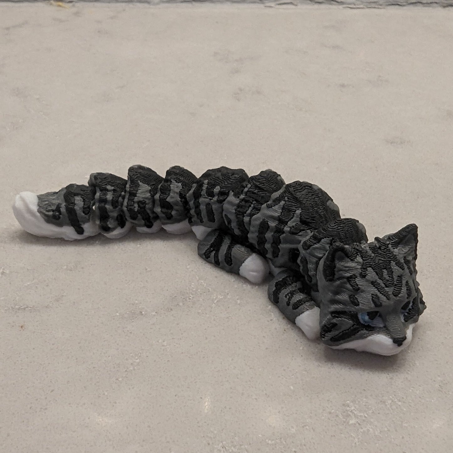 3d Printed Flexi Cats - White, Black and White, Yellow, Black, Siamese, Gray, Black with Purple Hat