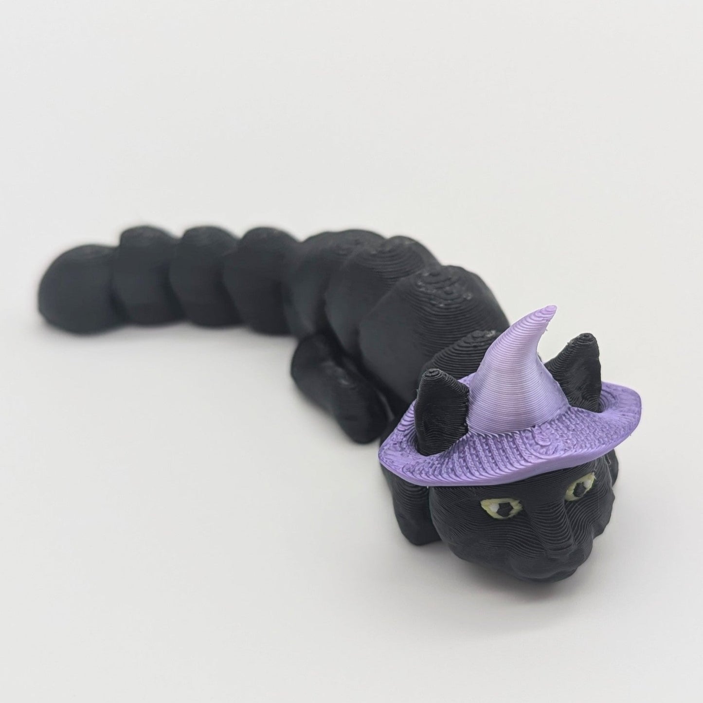 3d Printed Flexi Cats - White, Black and White, Yellow, Black, Siamese, Gray, Black with Purple Hat